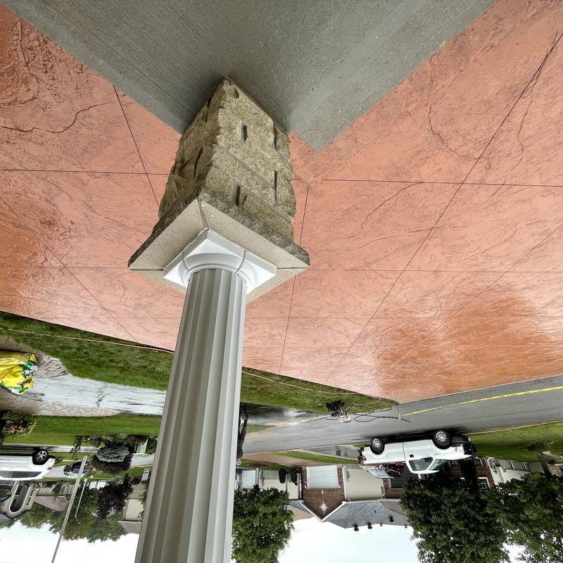 colored stamped concrete driveway