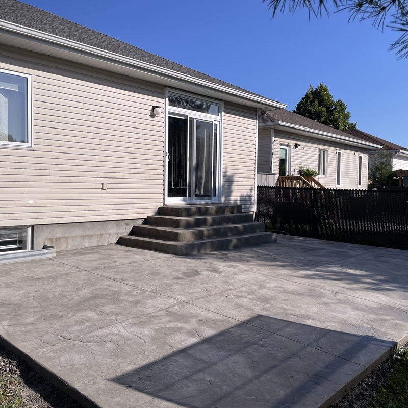 stamped concrete patio with stairs