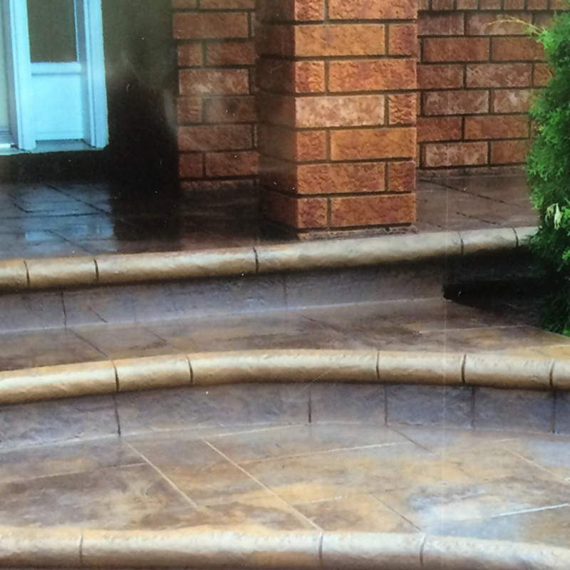 colored stamped concrete bullnose stairs 